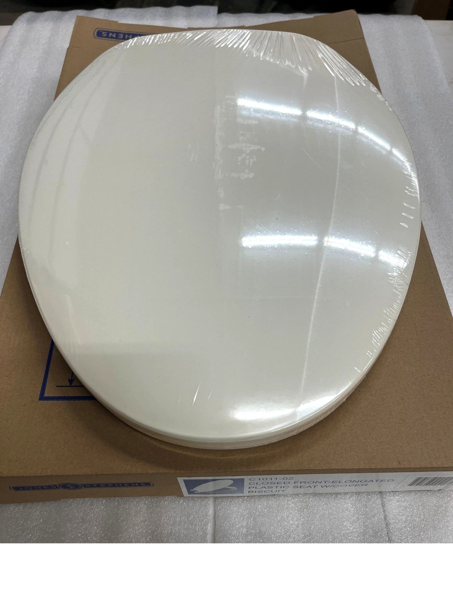 Jones Stephens C101102 Biscuit Elongated Plastic Toilet Seat with Cover