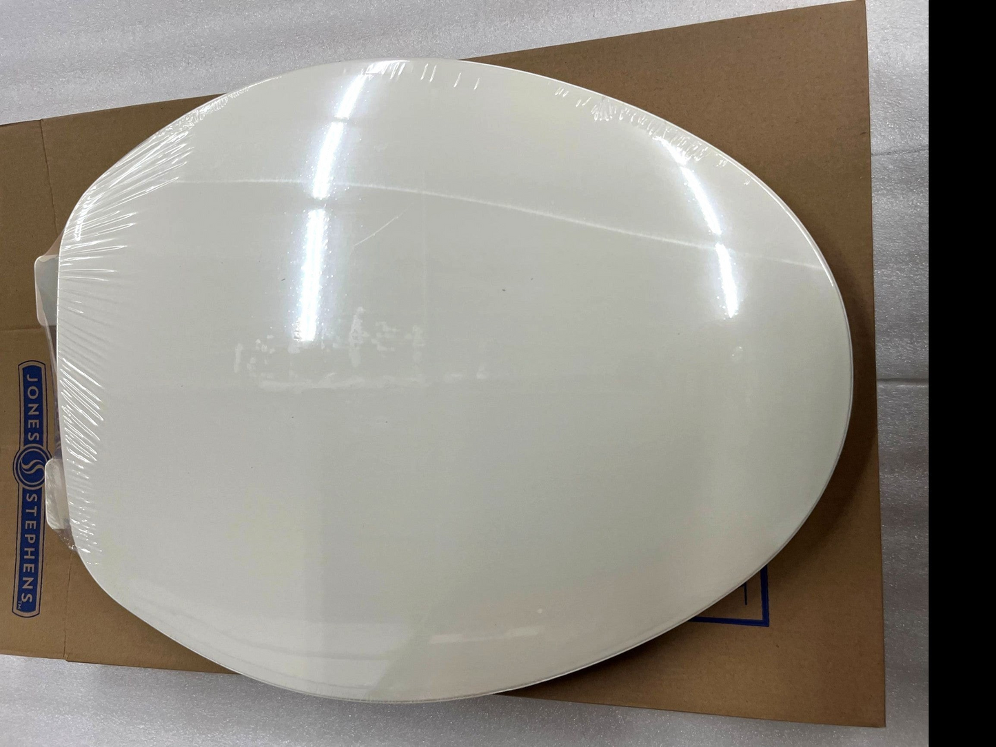 Jones Stephens C101102 Biscuit Elongated Plastic Toilet Seat with Cover