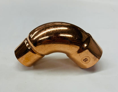 Jones Stephens 1-1/4" x 1" Copper Reducing 90° Elbow – Rough Close CxC