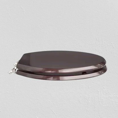 North Country Supply dark brown wooden toilet seat with lid and polished chrome hinges. Oval shape, comfortable and durable.