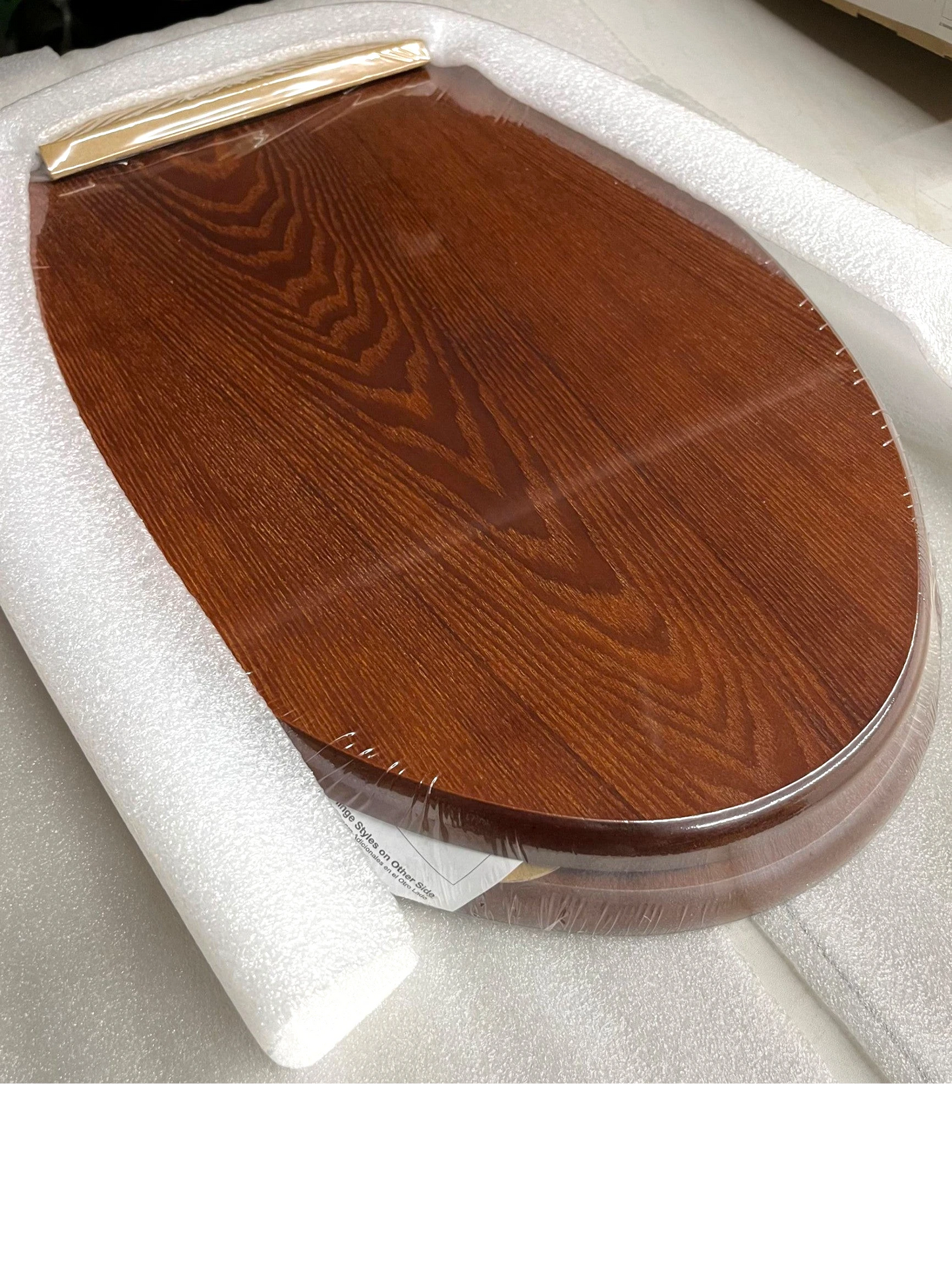 North Country Supply Decorative Wood Toilet Seat in cherry finish with brushed nickel hinges for elongated bowls.